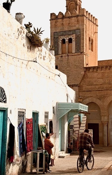 by Malcolm Bott on Flickr.Street scene in Kairouan, Tunisia.